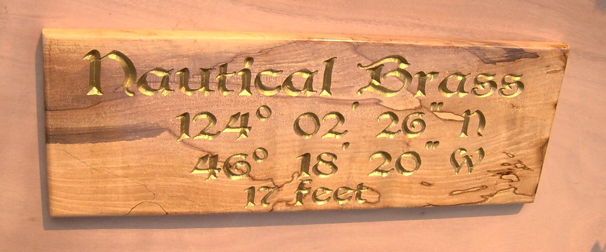 Spaulted maple with brass lettering